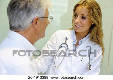 Doctor with patient, Consulting room, Onkologikoa Hospital, Oncology Institute, Case Center for prevention, diagnosis and treatment of cancer, Donostia, San Sebastian, Gipuzkoa, Basque Country, Spain View Large Photo Image Stock Photo - Doctor with patient, Consulting room, Onkologikoa Hospital, Oncology Institute, Case Center for prevention, diagnosis and treatment of cancer, Donostia, San Sebastian, Gipuzkoa, Basque Country, Spain. Fotosearch