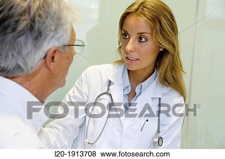 Doctor with patient, Consulting room, Onkologikoa Hospital, Oncology Institute, Case Center for prevention, diagnosis and treatment of cancer, Donostia, San Sebastian, Gipuzkoa, Basque Country, Spain View Large Photo Image Stock Photo - Doctor with patient, Consulting room, Onkologikoa Hospital, Oncology Institute, Case Center for prevention, diagnosis and treatment of cancer, Donostia, San Sebastian, Gipuzkoa, Basque Country, Spain. Fotosearch