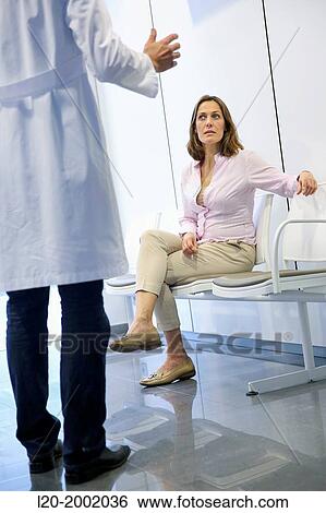 Doctor with patient in waiting room, Onkologikoa Hospital, Oncology Institute, Case Center for prevention, diagnosis and treatment of cancer, Donostia, San Sebastian, Gipuzkoa, Basque Country, Spain. View Large Photo Image Stock Photograph - Doctor with patient in waiting room, Onkologikoa Hospital, Oncology Institute, Case Center for prevention, diagnosis and treatment of cancer, Donostia, San Sebastian, Gipuzkoa, Basque Country, Spain.. Fotosearch