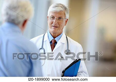 Doctor with stethoscope and tablet talking with patient, Onkologikoa Hospital, Oncology Institute, Case Center for prevention, diagnosis and treatment of cancer, Donostia, San Sebastian, Gipuzkoa, Basque Country, Spain View Large Photo Image Stock Image - Doctor with stethoscope and tablet talking with patient, Onkologikoa Hospital, Oncology Institute, Case Center for prevention, diagnosis and treatment of cancer, Donostia, San Sebastian, Gipuzkoa, Basque Country, Spain. Fotosearch