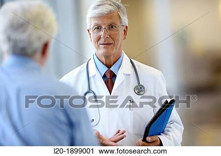 Doctor with stethoscope and tablet talking with patient, Onkologikoa Hospital, Oncology Institute, Case Center for prevention, diagnosis and treatment of cancer, Donostia, San Sebastian, Gipuzkoa, Basque Country, Spain View Large Photo Image Stock Image - Doctor with stethoscope and tablet talking with patient, Onkologikoa Hospital, Oncology Institute, Case Center for prevention, diagnosis and treatment of cancer, Donostia, San Sebastian, Gipuzkoa, Basque Country, Spain. Fotosearch