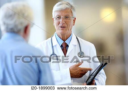 Doctor with stethoscope and tablet talking with patient, Onkologikoa Hospital, Oncology Institute, Case Center for prevention, diagnosis and treatment of cancer, Donostia, San Sebastian, Gipuzkoa, Basque Country, Spain View Large Photo Image Stock Image - Doctor with stethoscope and tablet talking with patient, Onkologikoa Hospital, Oncology Institute, Case Center for prevention, diagnosis and treatment of cancer, Donostia, San Sebastian, Gipuzkoa, Basque Country, Spain. Fotosearch
