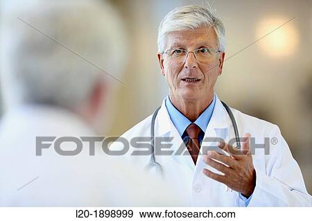 Doctor with stethoscope talking with patient, Onkologikoa Hospital, Oncology Institute, Case Center for prevention, diagnosis and treatment of cancer, Donostia, San Sebastian, Gipuzkoa, Basque Country, Spain View Large Photo Image Stock Photo - Doctor with stethoscope talking with patient, Onkologikoa Hospital, Oncology Institute, Case Center for prevention, diagnosis and treatment of cancer, Donostia, San Sebastian, Gipuzkoa, Basque Country, Spain. Fotosearch