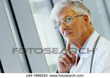 Picture - Doctor with tablet in corridor, Onkologikoa Hospital, Oncology Institute, Case Center for prevention, diagnosis and treatment of cancer, Donostia, San Sebastian, Gipuzkoa, Basque Country, Spain. Fotosearch