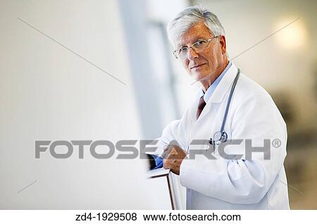 Doctor with tablet in corridor, Onkologikoa Hospital, Oncology Institute, Case Center for prevention, diagnosis and treatment of cancer, Donostia, San Sebastian, Gipuzkoa, Basque Country, Spain View Large Photo Image Stock Photo - Doctor with tablet in corridor, Onkologikoa Hospital, Oncology Institute, Case Center for prevention, diagnosis and treatment of cancer, Donostia, San Sebastian, Gipuzkoa, Basque Country, Spain. Fotosearch