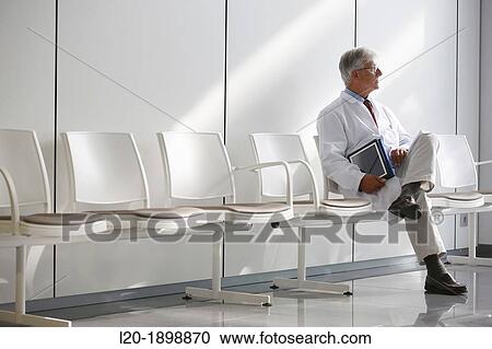 Doctor with tablet in waiting room, Onkologikoa Hospital, Oncology Institute, Case Center for prevention, diagnosis and treatment of cancer, Donostia, San Sebastian, Gipuzkoa, Basque Country, Spain View Large Photo Image Stock Image - Doctor with tablet in waiting room, Onkologikoa Hospital, Oncology Institute, Case Center for prevention, diagnosis and treatment of cancer, Donostia, San Sebastian, Gipuzkoa, Basque Country, Spain. Fotosearch