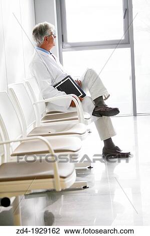 Doctor with tablet in waiting room, Onkologikoa Hospital, Oncology Institute, Case Center for prevention, diagnosis and treatment of cancer, Donostia, San Sebastian, Gipuzkoa, Basque Country, Spain View Large Photo Image Stock Image - Doctor with tablet in waiting room, Onkologikoa Hospital, Oncology Institute, Case Center for prevention, diagnosis and treatment of cancer, Donostia, San Sebastian, Gipuzkoa, Basque Country, Spain. Fotosearch