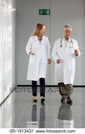 Doctors and nurses walking in corridor, Onkologikoa Hospital, Oncology Institute, Case Center for prevention, diagnosis and treatment of cancer, Donostia, San Sebastian, Gipuzkoa, Basque Country, Spain View Large Photo Image Stock Photo - Doctors and nurses walking in corridor, Onkologikoa Hospital, Oncology Institute, Case Center for prevention, diagnosis and treatment of cancer, Donostia, San Sebastian, Gipuzkoa, Basque Country, Spain. Fotosearch
