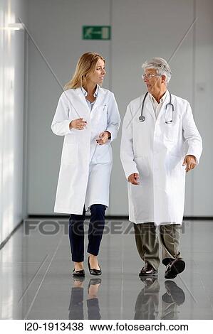 Doctors and nurses walking in corridor, Onkologikoa Hospital, Oncology Institute, Case Center for prevention, diagnosis and treatment of cancer, Donostia, San Sebastian, Gipuzkoa, Basque Country, Spain View Large Photo Image Stock Photo - Doctors and nurses walking in corridor, Onkologikoa Hospital, Oncology Institute, Case Center for prevention, diagnosis and treatment of cancer, Donostia, San Sebastian, Gipuzkoa, Basque Country, Spain. Fotosearch