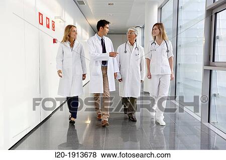 Doctors and nurses walking in corridor, Onkologikoa Hospital, Oncology Institute, Case Center for prevention, diagnosis and treatment of cancer, Donostia, San Sebastian, Gipuzkoa, Basque Country, Spain View Large Photo Image Stock Photo - Doctors and nurses walking in corridor, Onkologikoa Hospital, Oncology Institute, Case Center for prevention, diagnosis and treatment of cancer, Donostia, San Sebastian, Gipuzkoa, Basque Country, Spain. Fotosearch