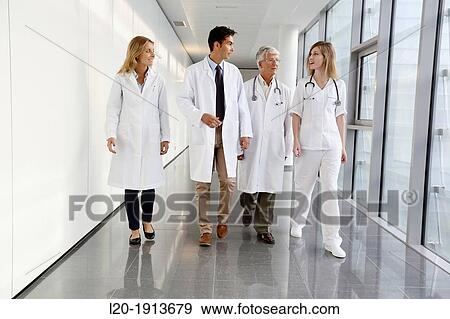 Doctors and nurses walking in corridor, Onkologikoa Hospital, Oncology Institute, Case Center for prevention, diagnosis and treatment of cancer, Donostia, San Sebastian, Gipuzkoa, Basque Country, Spain View Large Photo Image Stock Photo - Doctors and nurses walking in corridor, Onkologikoa Hospital, Oncology Institute, Case Center for prevention, diagnosis and treatment of cancer, Donostia, San Sebastian, Gipuzkoa, Basque Country, Spain. Fotosearch