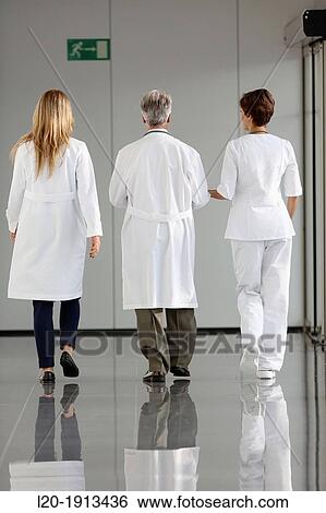 Doctors and nurses walking in corridor, Onkologikoa Hospital, Oncology Institute, Case Center for prevention, diagnosis and treatment of cancer, Donostia, San Sebastian, Gipuzkoa, Basque Country, Spain View Large Photo Image Stock Photograph - Doctors and nurses walking in corridor, Onkologikoa Hospital, Oncology Institute, Case Center for prevention, diagnosis and treatment of cancer, Donostia, San Sebastian, Gipuzkoa, Basque Country, Spain. Fotosearch