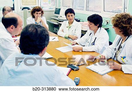 Stock Image - Doctors at training meeting in hospital. Fotosearch