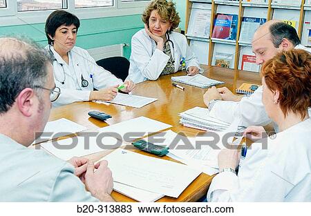 Stock Image - Doctors at training meeting in hospital. Fotosearch
