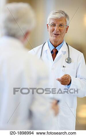 Doctors with stethoscope and tablet in corridor, Onkologikoa Hospital, Oncology Institute, Case Center for prevention, diagnosis and treatment of cancer, Donostia, San Sebastian, Gipuzkoa, Basque Country, Spain View Large Photo Image Picture - Doctors with stethoscope and tablet in corridor, Onkologikoa Hospital, Oncology Institute, Case Center for prevention, diagnosis and treatment of cancer, Donostia, San Sebastian, Gipuzkoa, Basque Country, Spain. Fotosearch
