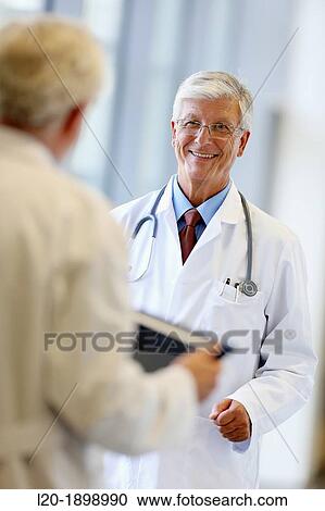 Doctors with stethoscope and tablet in corridor, Onkologikoa Hospital, Oncology Institute, Case Center for prevention, diagnosis and treatment of cancer, Donostia, San Sebastian, Gipuzkoa, Basque Country, Spain View Large Photo Image Stock Image - Doctors with stethoscope and tablet in corridor, Onkologikoa Hospital, Oncology Institute, Case Center for prevention, diagnosis and treatment of cancer, Donostia, San Sebastian, Gipuzkoa, Basque Country, Spain. Fotosearch