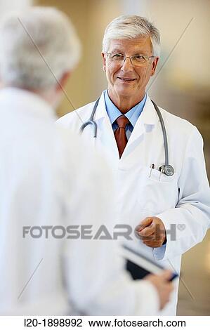 Doctors with stethoscope and tablet in corridor, Onkologikoa Hospital, Oncology Institute, Case Center for prevention, diagnosis and treatment of cancer, Donostia, San Sebastian, Gipuzkoa, Basque Country, Spain View Large Photo Image Stock Image - Doctors with stethoscope and tablet in corridor, Onkologikoa Hospital, Oncology Institute, Case Center for prevention, diagnosis and treatment of cancer, Donostia, San Sebastian, Gipuzkoa, Basque Country, Spain. Fotosearch