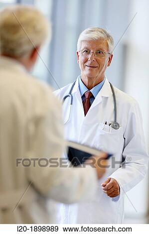 Doctors with stethoscope and tablet in corridor, Onkologikoa Hospital, Oncology Institute, Case Center for prevention, diagnosis and treatment of cancer, Donostia, San Sebastian, Gipuzkoa, Basque Country, Spain View Large Photo Image Stock Photo - Doctors with stethoscope and tablet in corridor, Onkologikoa Hospital, Oncology Institute, Case Center for prevention, diagnosis and treatment of cancer, Donostia, San Sebastian, Gipuzkoa, Basque Country, Spain. Fotosearch