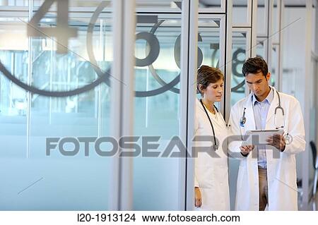 Doctors with tablet, Box chemotherapy, Onkologikoa Hospital, Oncology Institute, Case Center for prevention, diagnosis and treatment of cancer, Donostia, San Sebastian, Gipuzkoa, Basque Country, Spain View Large Photo Image Picture - Doctors with tablet, Box chemotherapy, Onkologikoa Hospital, Oncology Institute, Case Center for prevention, diagnosis and treatment of cancer, Donostia, San Sebastian, Gipuzkoa, Basque Country, Spain. Fotosearch