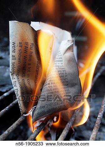 Stock Image - Document on fire. Fotosearch
