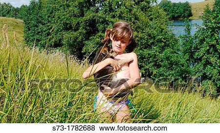 Stock Photo - Dog and girl. Fotosearch