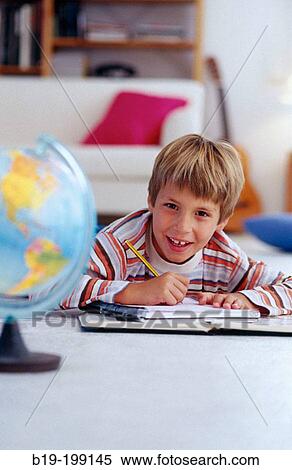 Doing homework View Large Photo Image Stock Photography - Doing homework. Fotosearch