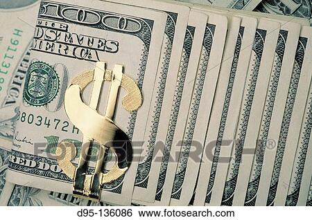 Dollar bills and dollar sign View Large Photo Image Stock Photograph - Dollar bills and dollar sign. Fotosearch