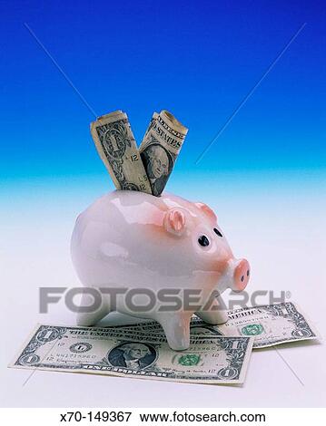 Dollars bills and piggy bank View Large Photo Image Stock Photo - Dollars bills and piggy bank. Fotosearch