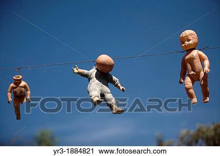 Dolls hang on the Island of the Dolls in Xochimilco, southern Mexico City View Large Photo Image Stock Image - Dolls hang on the Island of the Dolls in Xochimilco, southern Mexico City. Fotosearch