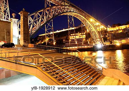 Dom Luis I bridge over Douro river at dusk, Porto, Portugal View Large Photo Image Stock Image - Dom Luis I bridge over Douro river at dusk, Porto, Portugal. Fotosearch