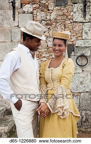 Stock Image - Dominican Republic, La Romana, Altos de Chavon, Dominican dancing couple in costume, R, MR-DRE-09-04, MR-DRE-09-05. Fotosearch