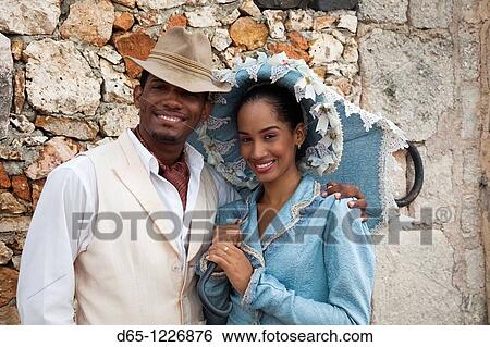 Stock Photograph - Dominican Republic, La Romana, Altos de Chavon, Dominican dancing couple in costume, R, MR-DRE-09-02, MR-DRE-09-03. Fotosearch