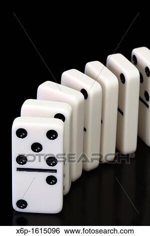 Dominoes ready to topple View Large Photo Image Stock Photograph - Dominoes ready to topple. Fotosearch