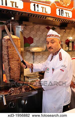 Stock Image - doner maker in Asmaalti Carsi or Main Market area of Istanbul, Turkey.. Fotosearch