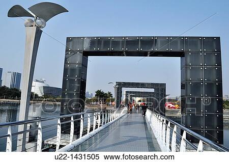 Dongguan (China): modern bridge on the artificial lake by the Dongguan Library, in the Nancheng District View Large Photo Image Stock Photography - Dongguan (China): modern bridge on the artificial lake by the Dongguan Library, in the Nancheng District. Fotosearch