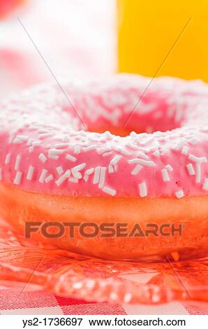 Donut with sprinkles View Large Photo Image Stock Photo - Donut with sprinkles. Fotosearch