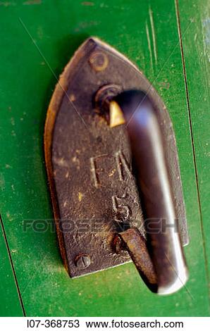Doorknob in shape of iron. Riviera. France View Large Photo Image Stock Image - Doorknob in shape of iron. Riviera. France. Fotosearch
