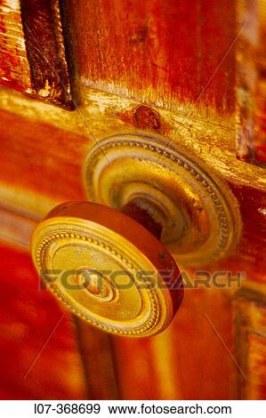 Stock Photo - Doorknob on wooden door. Cassis. Riviera. France. Fotosearch