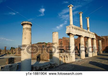 Doric & Corinthian columns of the Roman colonade in the Forum of Pompeii View Large Photo Image Picture - Doric & Corinthian columns of the Roman colonade in the Forum of Pompeii. Fotosearch