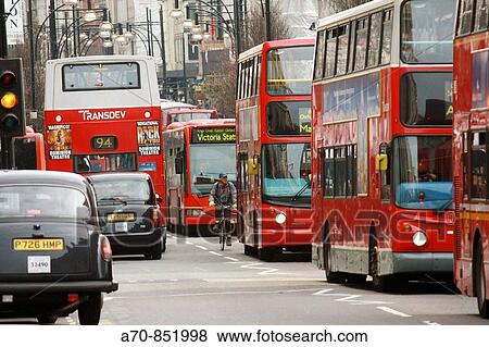 Double-decker red buses and taxis. London. England View Large Photo Image Stock Photo - Double-decker red buses and taxis. London. England. Fotosearch
