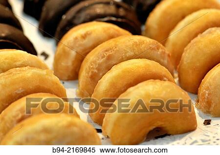 Doughnut or donut is a type of fried dough confectionery or dessert food. Alimentaria, International Food and Drinks Exhibition, Fira de Barcelona. L? Hospitalet de Llobregat, Barcelona, Catalonia, Spain. View Large Photo Image Stock Photography - Doughnut or donut is a type of fried dough confectionery or dessert food. Alimentaria, International Food and Drinks Exhibition, Fira de Barcelona. L? Hospitalet de Llobregat, Barcelona, Catalonia, Spain.. Fotosearch