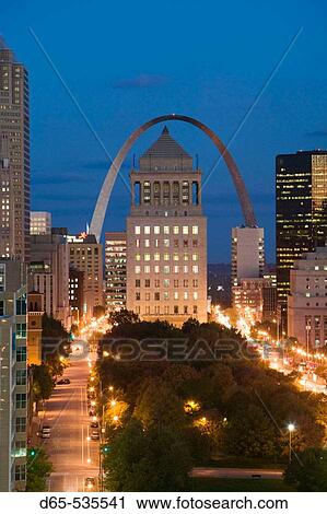 Stock Image - Downtown & Gateway Arch from the West at evening. St. Louis. Missouri, USA.. Fotosearch