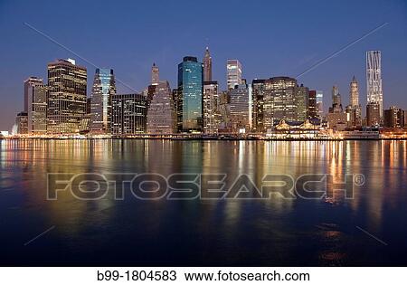 DOWNTOWN SKYLINE EAST RIVER MANHATTAN NEW YORK CITY USA View Large Photo Image Stock Image - DOWNTOWN SKYLINE EAST RIVER MANHATTAN NEW YORK CITY USA. Fotosearch