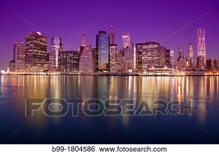 Stock Photograph - DOWNTOWN SKYLINE EAST RIVER MANHATTAN NEW YORK CITY USA. Fotosearch