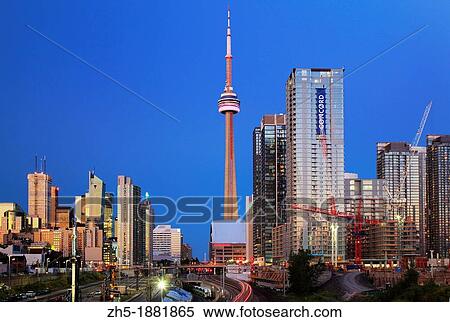 Stock Photography - Downtown Toronto skyline, including CN Tower and Rogers Center, as seen in the early evening. Fotosearch