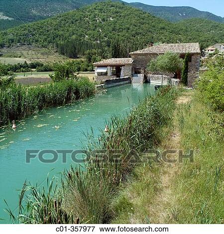 Dr? me river and renovated water driven olive mill house. Dr? me, Provence. France. View Large Photo Image Stock Photo - Dr? me river and renovated water driven olive mill house. Dr? me, Provence. France.. Fotosearch