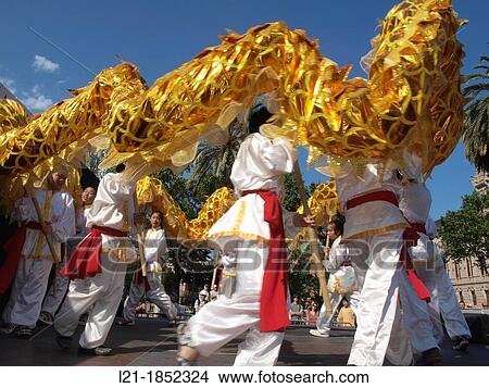 Dragon dance by children. Chinese tradition, folklore. Barcelona, Catalonia, Spain. View Large Photo Image Picture - Dragon dance by children. Chinese tradition, folklore. Barcelona, Catalonia, Spain.. Fotosearch