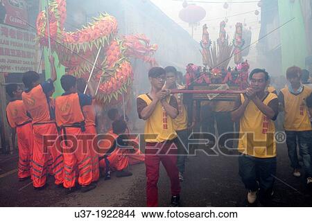 Dragon dance during Chinese New Year Festival Capgomeh year 2013 15th day of the 1st month at Siniawan, Sarawak, Malaysia View Large Photo Image Picture - Dragon dance during Chinese New Year Festival Capgomeh year 2013 15th day of the 1st month at Siniawan, Sarawak, Malaysia. Fotosearch