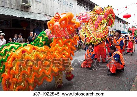 Dragon dance during Chinese New Year Festival Capgomeh year 2013 15th day of the 1st month at Siniawan, Sarawak, Malaysia View Large Photo Image Stock Photography - Dragon dance during Chinese New Year Festival Capgomeh year 2013 15th day of the 1st month at Siniawan, Sarawak, Malaysia. Fotosearch