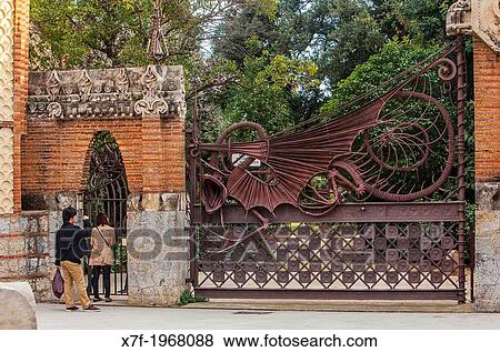 Dragon on iron gate at Pavellons de la Finca Guell, by Antonio Gaudi. Barcelona. Catalonia. Spain. View Large Photo Image Stock Photo - Dragon on iron gate at Pavellons de la Finca Guell, by Antonio Gaudi. Barcelona. Catalonia. Spain.. Fotosearch